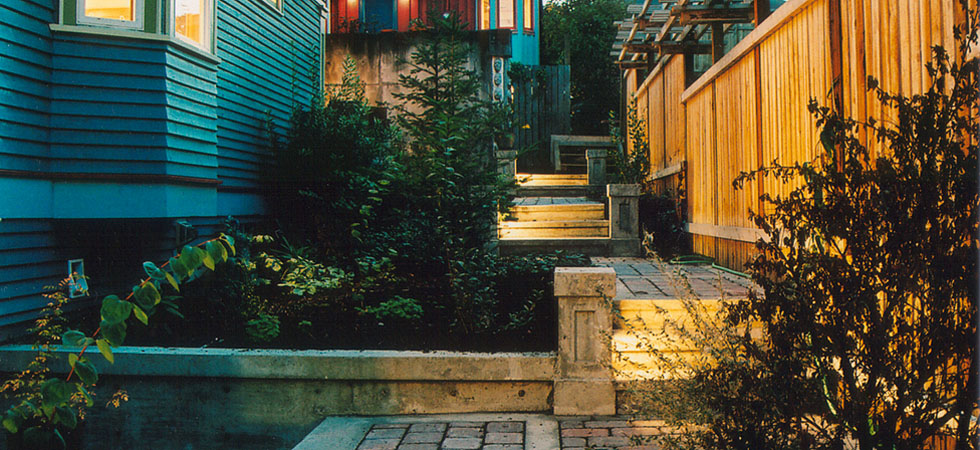 A welcoming, illuminated walkway at dusk.